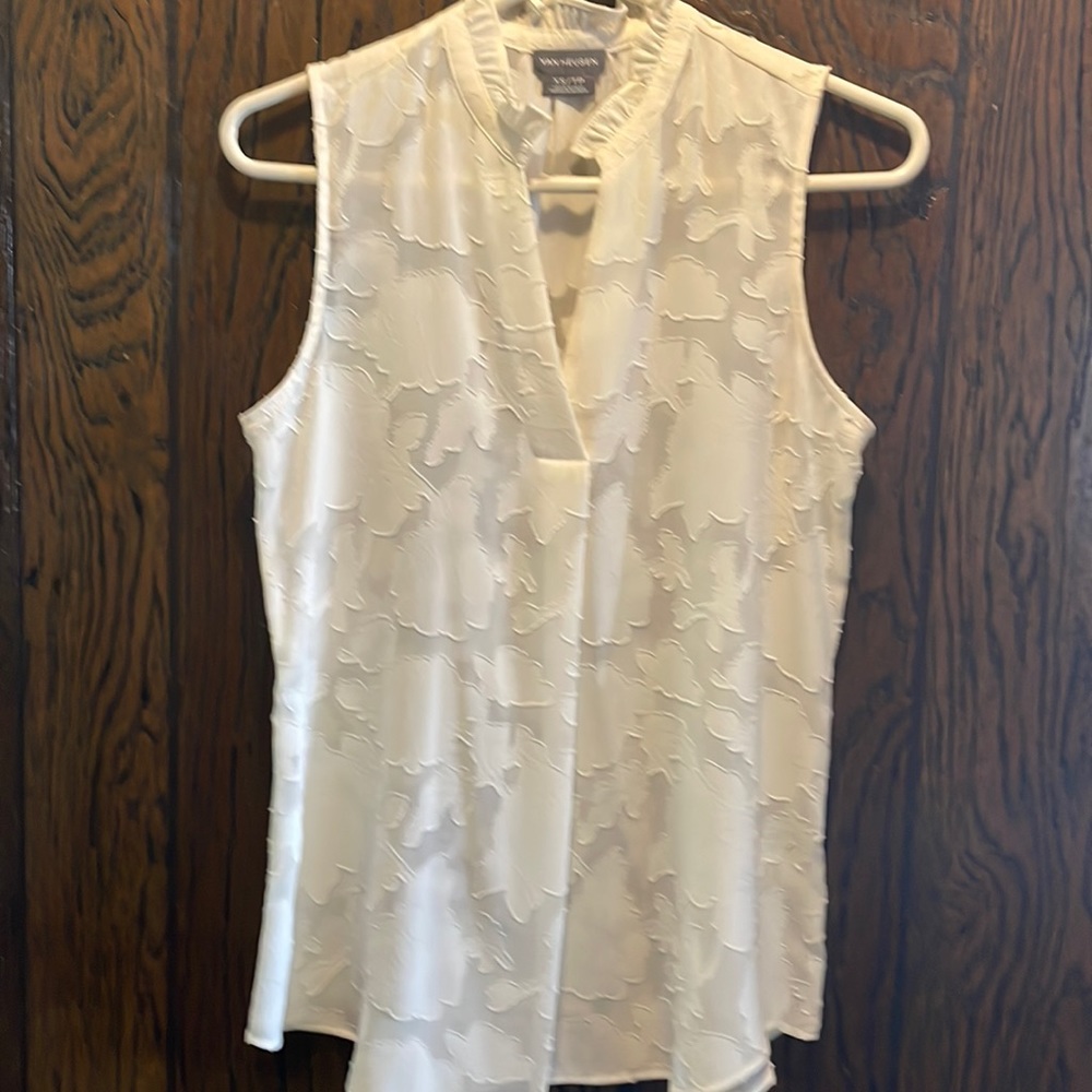 White sleeveless top